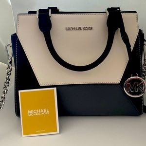Michael KORS satchel; Black, white and gray.  Never used.